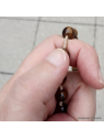 prier avec le chapelet en oeil de tigre