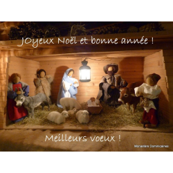Carte avec une crèche de Noë et voeux de bonne année.